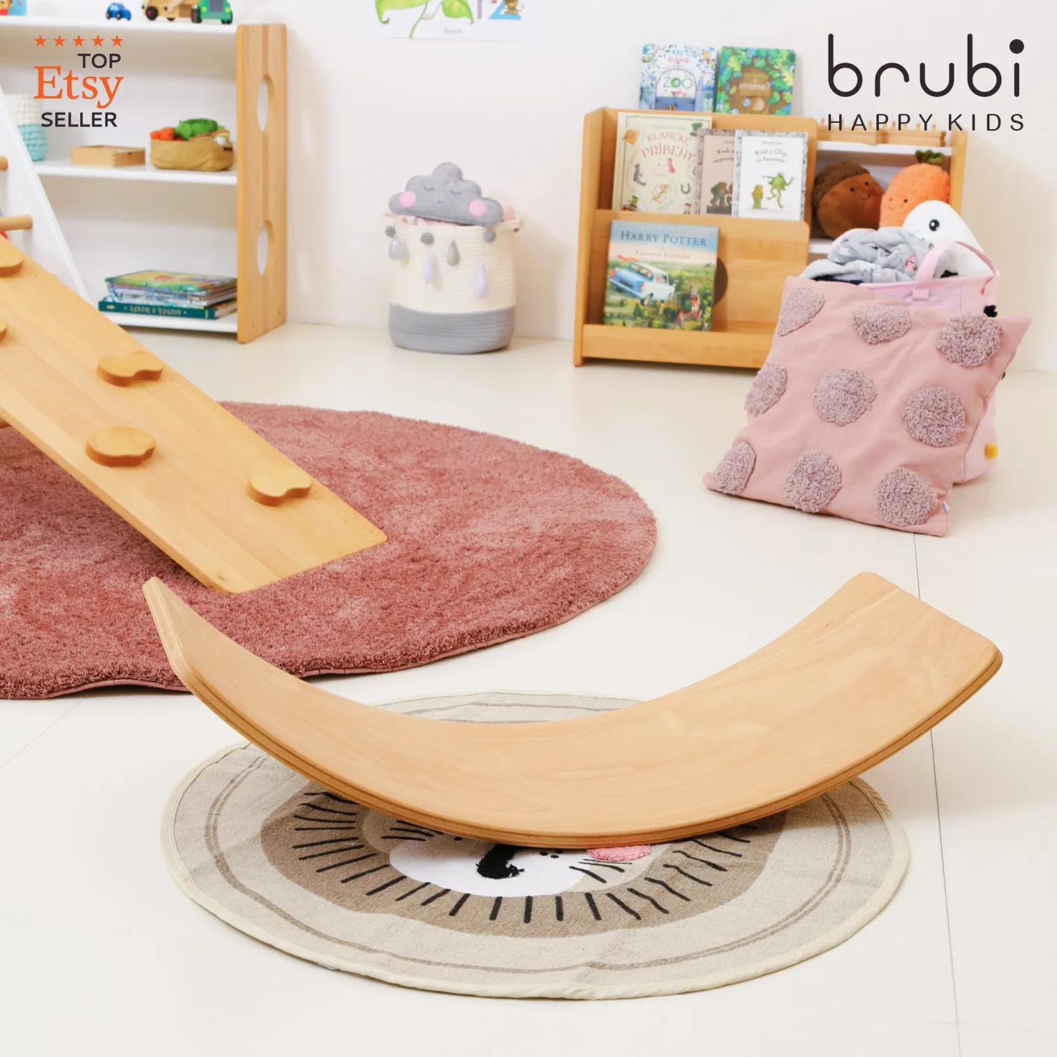 Curved wooden balance board for kids, part of CLIMBIE Montessori movement set