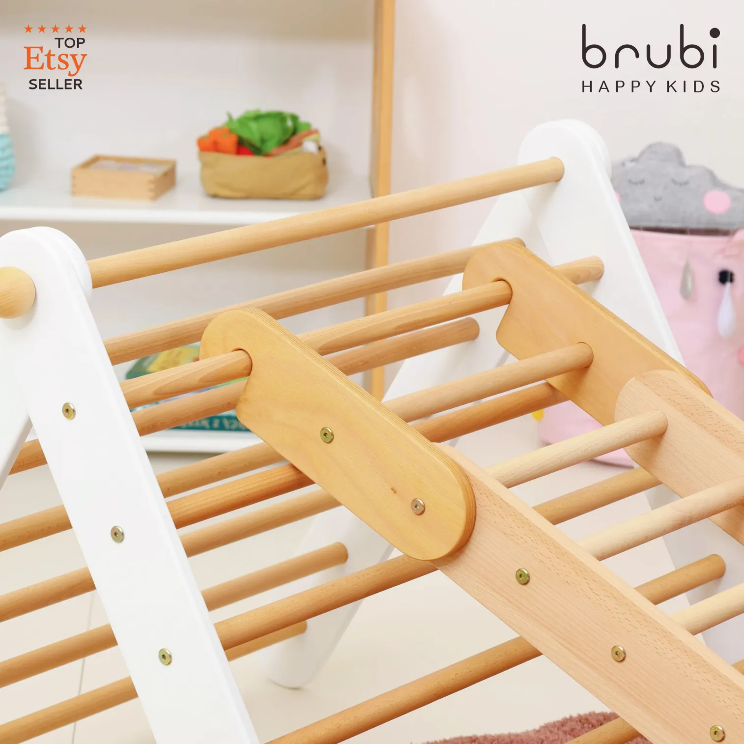 Scandi style Montessori climbing triangle with white side panels and natural beech wood rungs