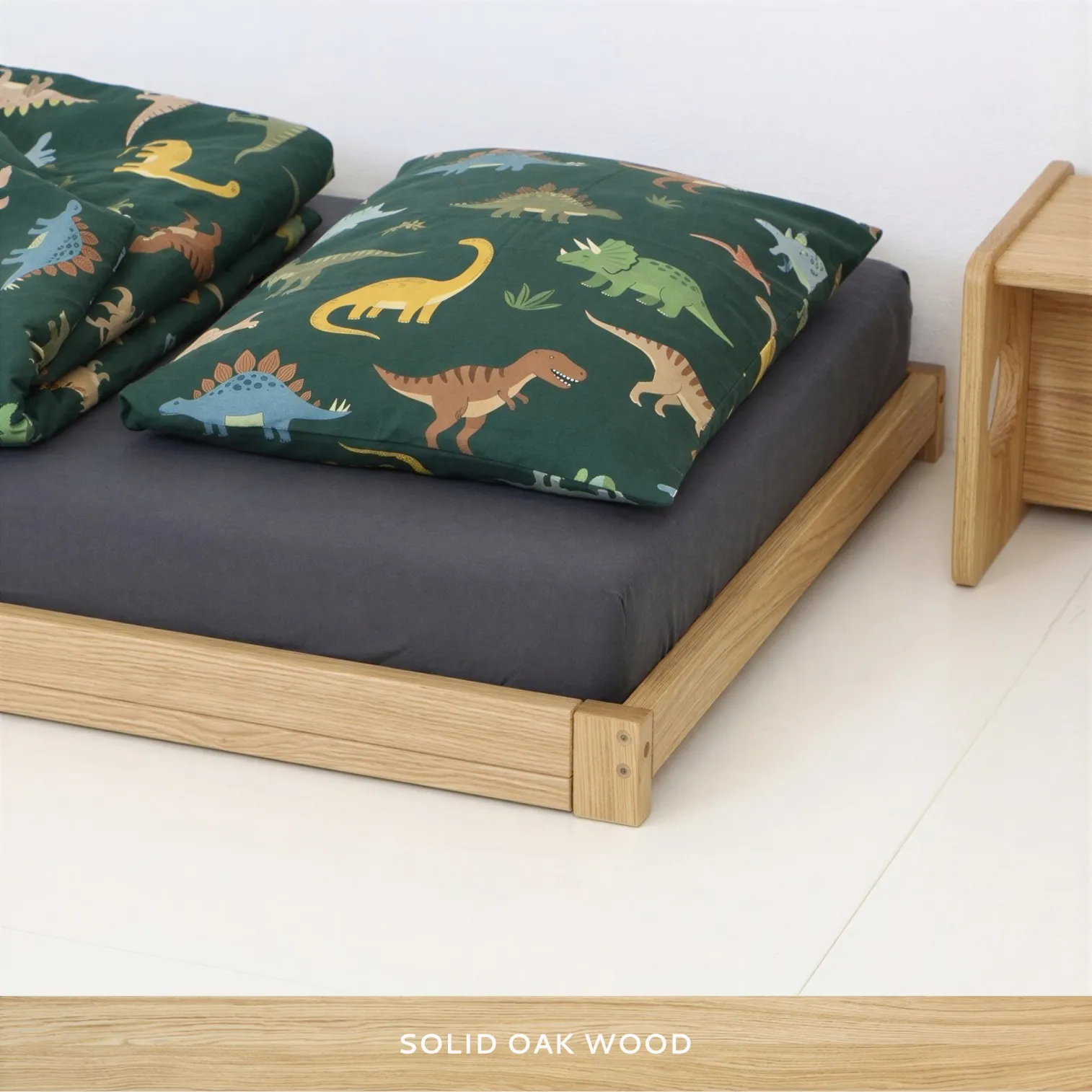 Solid oak wood grain detail on premium kids floor bed frame