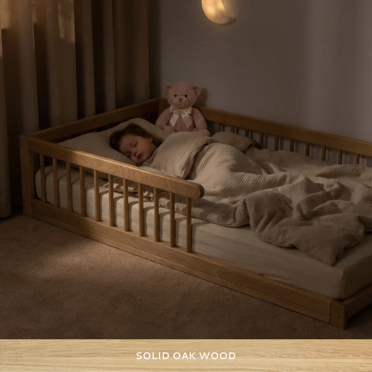 Kids floor bed with side safety rail and low Montessori design for easy access